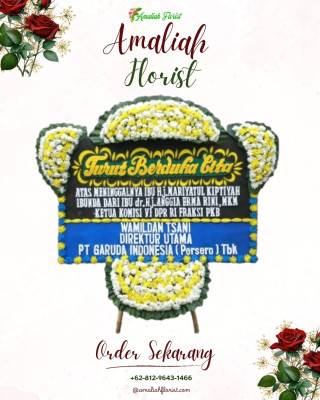 Papan Bunga Duka di Angin Nauli