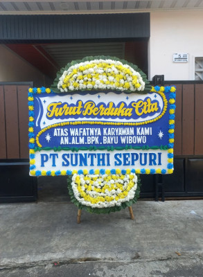 Papan Bunga Duka di Angin Nauli