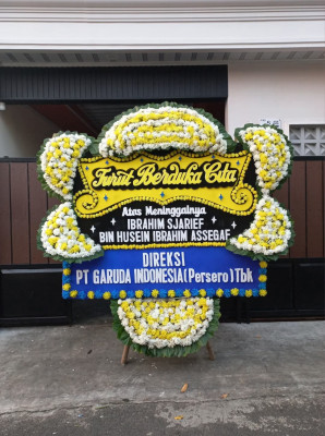 Papan Bunga Duka di Angin Nauli